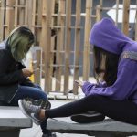 uso-de-celular-coluna-cervical